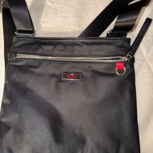 Tumi Black Messenger Bag with Red Accent